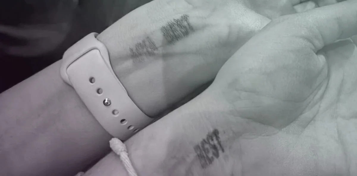 A wristband reading BEST