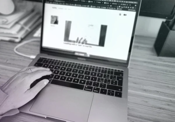 Writing at a laptop